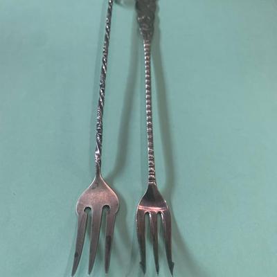 Long Twisted Sterling Forks E. Howard & Another