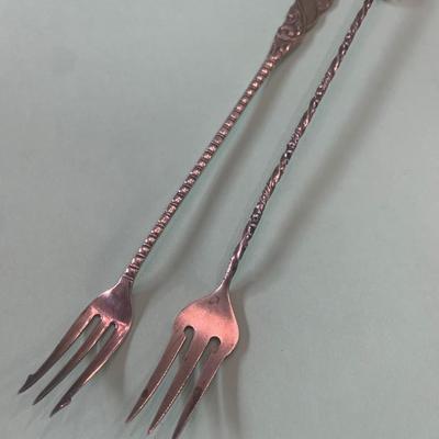 Long Twisted Sterling Forks E. Howard & Another