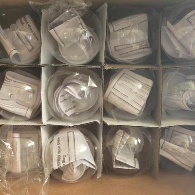 Box of New Plastic Snow Globe Making Containers