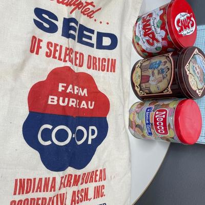Vintage seed bag and tins
