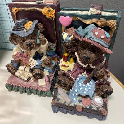 Pink depression, bowl, trinket boxes, teddy bear, bookends, and needlepoint picture of lighthouse