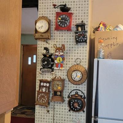 Nine wall clocks
