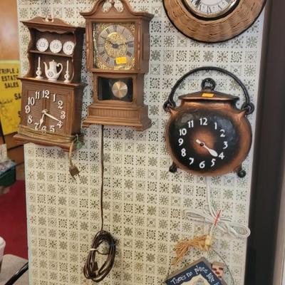 Nine wall clocks