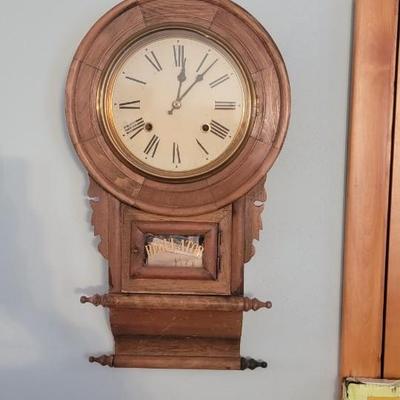 Sale Photo Thumbnail #59: Beautiful circa 1900 Regulator wall clock with key and some information on history! Untested. Measures 12" W, 23"H, 4" W.