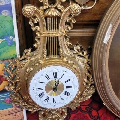 Five wall pieces includes New Haven wall clock