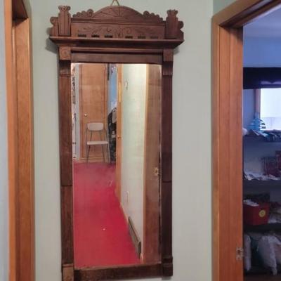 Sale Photo Thumbnail #95: Carved wood hall mirror, measuring 21.5" W, 51..5 H, 1.5 W.  Some damage