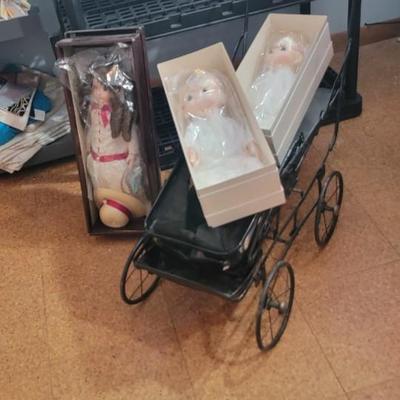 Sale Photo Thumbnail #211: Two Precious Moment dolls In original box, plus buggy and another doll in original box.