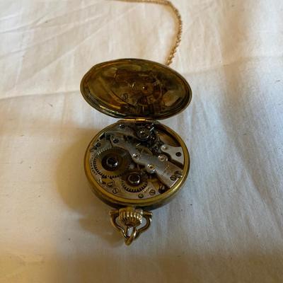 Gold Swiss Abra Watch Co Pocket Watch on gold toned chain