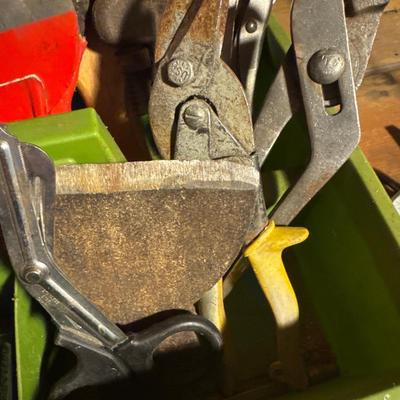 Green tray of various tools