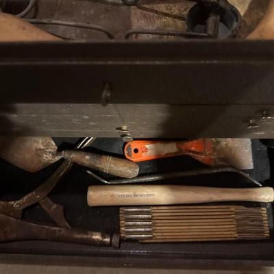 Metal toolbox with a lot of specialty tools