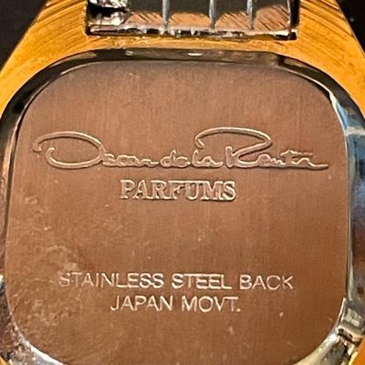 LOT 11: Oscar de la Renta Goldtone Quartz Ladies Wristwatch and Tote Umbrella, Beige Striped Umbrella With Wooden Handle by Neyra, and...