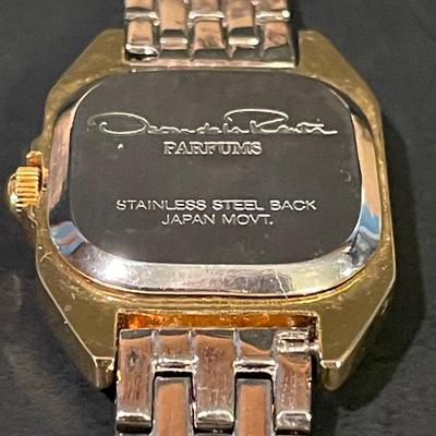 LOT 11: Oscar de la Renta Goldtone Quartz Ladies Wristwatch and Tote Umbrella, Beige Striped Umbrella With Wooden Handle by Neyra, and...