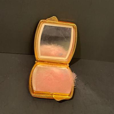 LOT: 12 Shearling Hat and Mittens, Sophia Loren Coffee Table Book, Vintage Brown Leather Powder Compact, and Silk Scarves