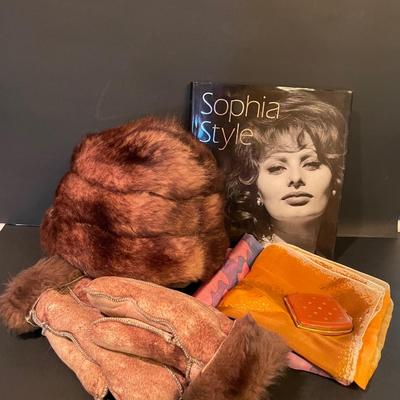 LOT: 12 Shearling Hat and Mittens, Sophia Loren Coffee Table Book, Vintage Brown Leather Powder Compact, and Silk Scarves