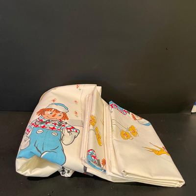 LOT::19 Adorable Array of Raggedy Ann and Andy Mementos Including Party Decorations and Invitations, Commemorative Jewelry, Bed Linens,...