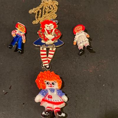 LOT::19 Adorable Array of Raggedy Ann and Andy Mementos Including Party Decorations and Invitations, Commemorative Jewelry, Bed Linens,...