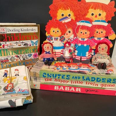 LOT::19 Adorable Array of Raggedy Ann and Andy Mementos Including Party Decorations and Invitations, Commemorative Jewelry, Bed Linens,...