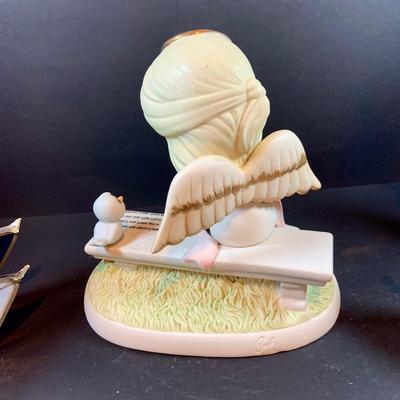 LOT 29: Angelic Collection of Figurines & Stain Glass Book- 2003 Demdaco Nancy Carter Angel, Precious Moments & more