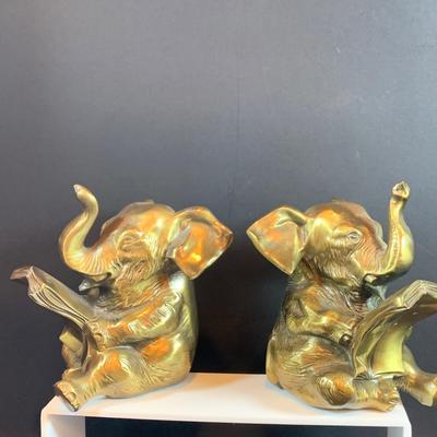 LOT 31: Elephant on Parade Collection of Brass Elephant Book Ends a Brass Elephant from India and Ceramic Figurines