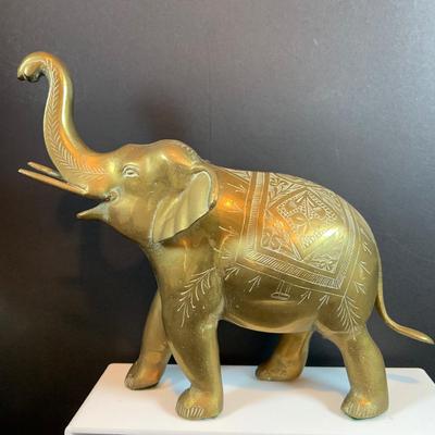 LOT 31: Elephant on Parade Collection of Brass Elephant Book Ends a Brass Elephant from India and Ceramic Figurines