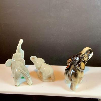 LOT 31: Elephant on Parade Collection of Brass Elephant Book Ends a Brass Elephant from India and Ceramic Figurines