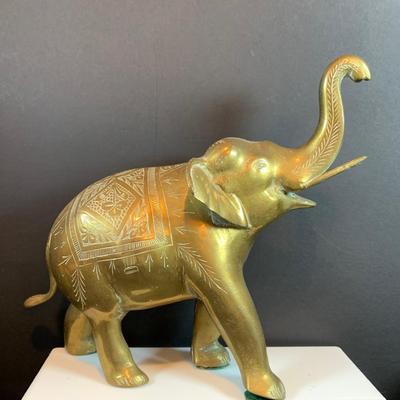 LOT 31: Elephant on Parade Collection of Brass Elephant Book Ends a Brass Elephant from India and Ceramic Figurines