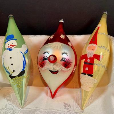 LOT:36: DeCarlini Blown Glass Ornaments Including Duck, Bears, Santas, Raggedy Ann & Andy Snowmen and More