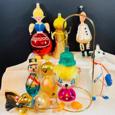 LOT:37: Collection of DeCarlini Blown Glass Ornaments Including Le Befana, Astropup, Mouse, Dutch Girl, soldier, Bird Angel, and Pierrot