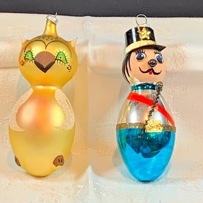 LOT:37: Collection of DeCarlini Blown Glass Ornaments Including Le Befana, Astropup, Mouse, Dutch Girl, soldier, Bird Angel, and Pierrot