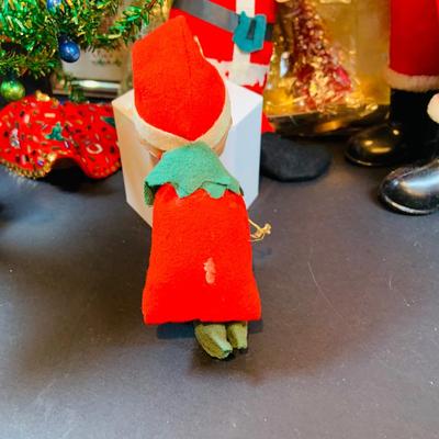 LOT 41: Vintage Christmas Collection Including a Knee Hugger Elf, a Doll with a Santa Mask, Bobbing Head Deer, Milk Glass Bowl and Much More