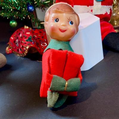 LOT 41: Vintage Christmas Collection Including a Knee Hugger Elf, a Doll with a Santa Mask, Bobbing Head Deer, Milk Glass Bowl and Much More