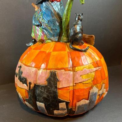LOT 53: Jim Shore Halloween Witch on a Pumpkin " An Eerie Eve Awaits" Figurine and Holloween Candle Sticks and Toppers