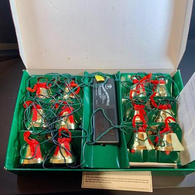 LOT 54: Old Time Christmas Decor Including Caroling Christmas Bells, Plastic Light-up Candle, Santa with Bell and Holiday Table Runners...