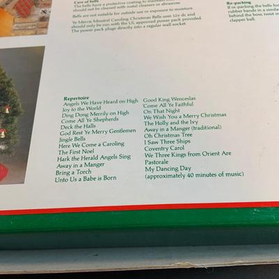 LOT 54: Old Time Christmas Decor Including Caroling Christmas Bells, Plastic Light-up Candle, Santa with Bell and Holiday Table Runners...