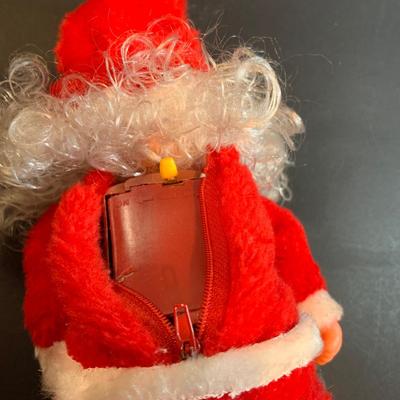 LOT 54: Old Time Christmas Decor Including Caroling Christmas Bells, Plastic Light-up Candle, Santa with Bell and Holiday Table Runners...