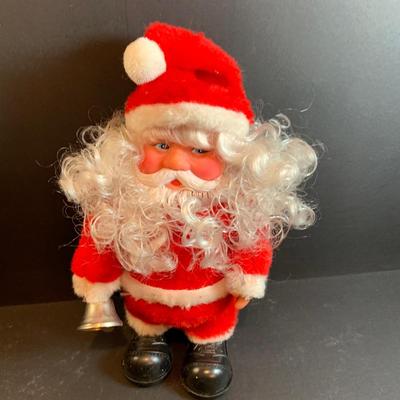 LOT 54: Old Time Christmas Decor Including Caroling Christmas Bells, Plastic Light-up Candle, Santa with Bell and Holiday Table Runners...