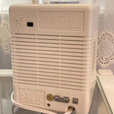 LOT 56: Vintage Sony Clock Radio Model TFM-C550W, French Style Princess Telephone and End Table