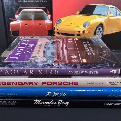 LOT 68: Collection of Automobile Books and Vintage Manuals