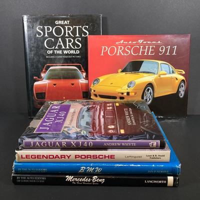 LOT 68: Collection of Automobile Books and Vintage Manuals
