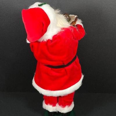 LOT 73: Byers' Choice Ltd Santa Claus with Basket of Chocolate, Byers' Choice Pair of Carolers and Decorative Ornaments