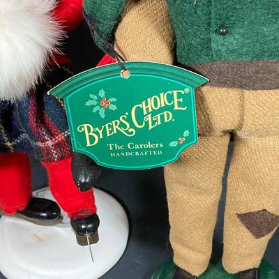 LOT 74: Vintage Byers' Choice Ltd - Bob Cratchit & Tiny Tim, The Skaters and The Carolers