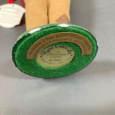 LOT 74: Vintage Byers' Choice Ltd - Bob Cratchit & Tiny Tim, The Skaters and The Carolers