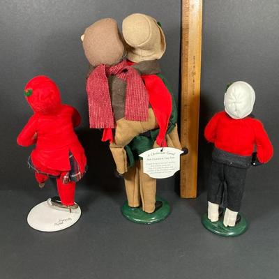 LOT 74: Vintage Byers' Choice Ltd - Bob Cratchit & Tiny Tim, The Skaters and The Carolers