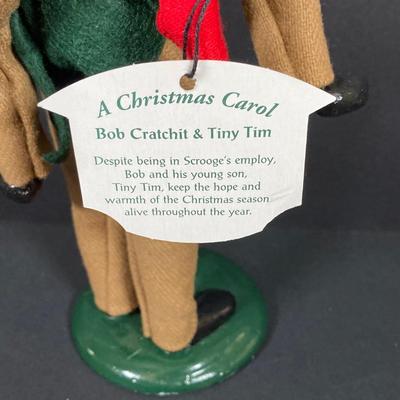 LOT 74: Vintage Byers' Choice Ltd - Bob Cratchit & Tiny Tim, The Skaters and The Carolers
