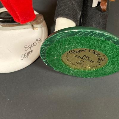 LOT 74: Vintage Byers' Choice Ltd - Bob Cratchit & Tiny Tim, The Skaters and The Carolers