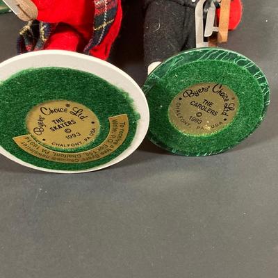 LOT 74: Vintage Byers' Choice Ltd - Bob Cratchit & Tiny Tim, The Skaters and The Carolers