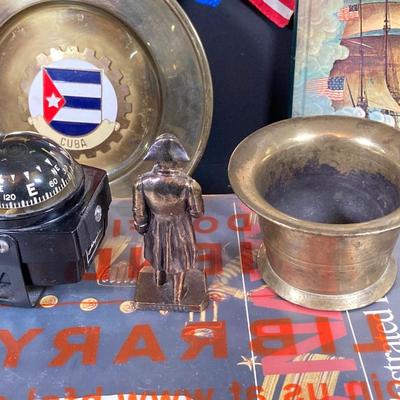 LOT 75: Nautical Books, Flags (Spain, Cuba and USA), Brass Plate and Mini Spittoon, Napolean Figurine and More