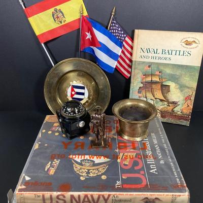 LOT 75: Nautical Books, Flags (Spain, Cuba and USA), Brass Plate and Mini Spittoon, Napolean Figurine and More