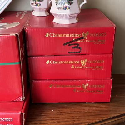 LOT 82: Nikko Christmastime China - 3 Boxes of Cups, Saucers and Plates, Two Tier Tray In Box, 3 Boxes of Salad Plates, a Serving...