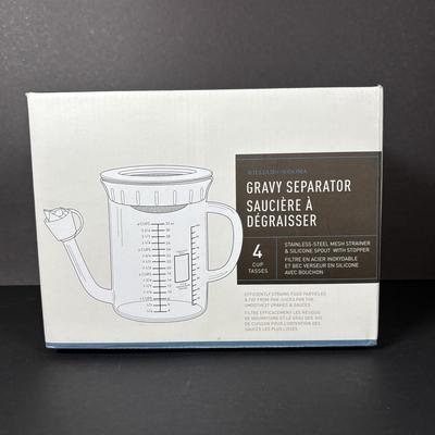 LOT 84: Cuisinart Compact Deep Fryer In Box, (2) Cuisinart 10" Frittata Pans, Glass Gravy Separator in Box, Cutting Board and More